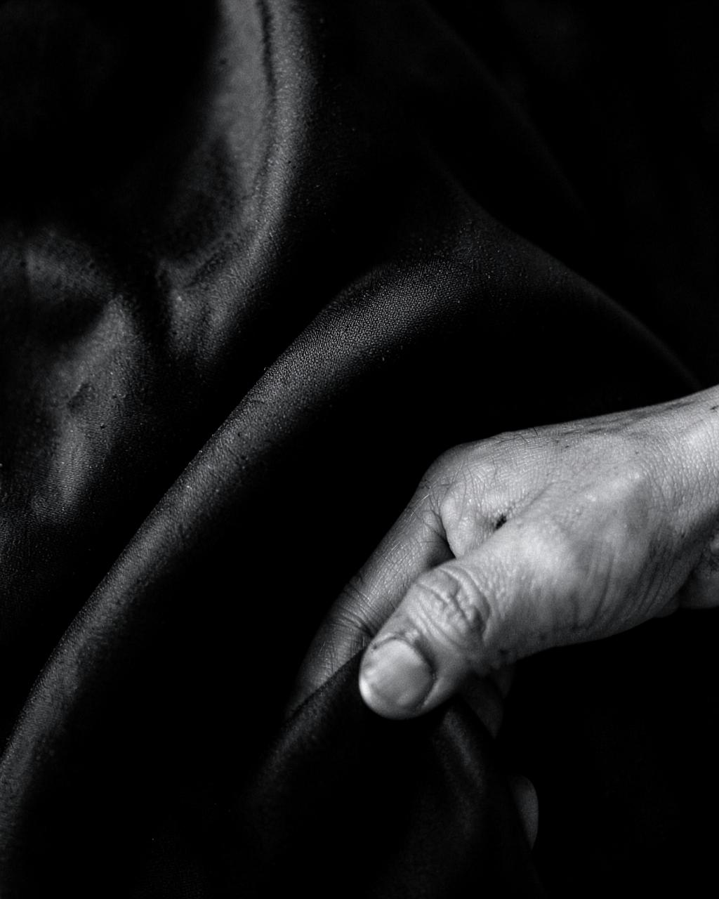 Close-up of draped black fabric